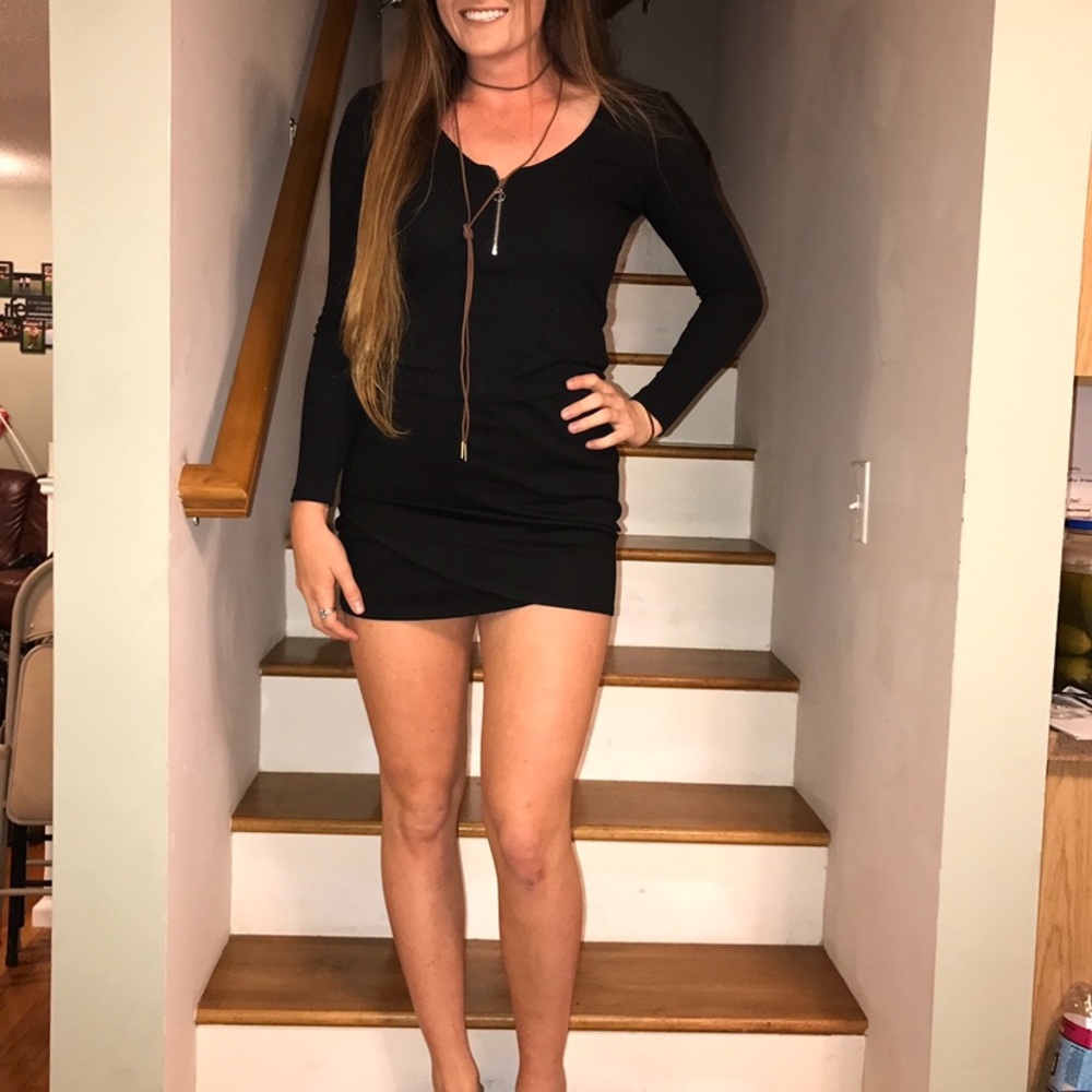 black asymmetric wrap mini skirt .